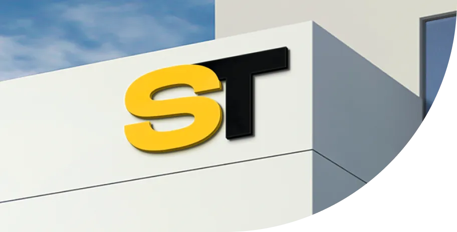 A styrofoam sign on the side of a building.